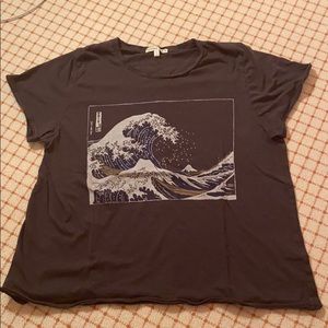 Grey tee shirt with blue and white wave